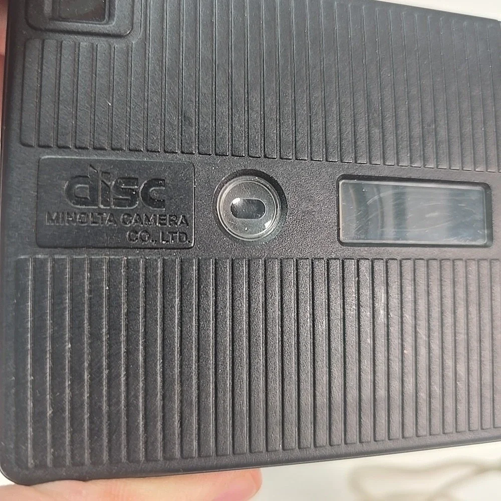 Minolta Disc‎ 5 Disc Film Camera, silver, with Case